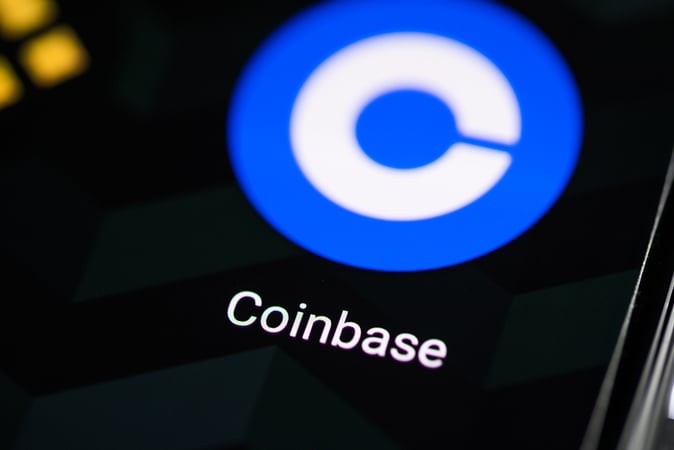 Coinbase Stock Down 5% in Pre-Market, Cathie Wood’s ARK Invest Sold $49.2M Worth of COIN Shares on Friday